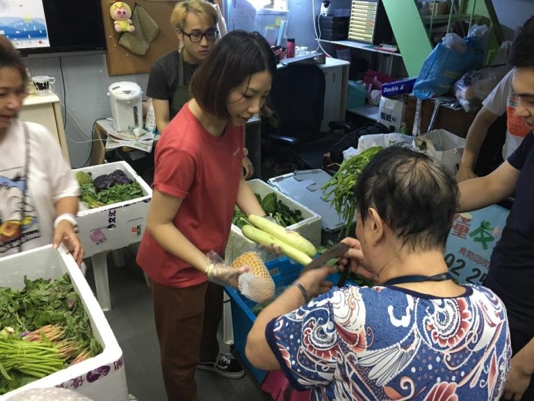 Volunteers were helping to deliver the vegetables collected to the public